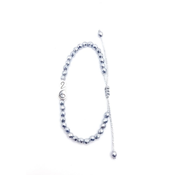 Βραχιόλι - Γούρι με μεταλλικό στοιχείο και αιματίτες Βραχιόλι - Γούρι με μεταλλικό στοιχείο και αιματίτες